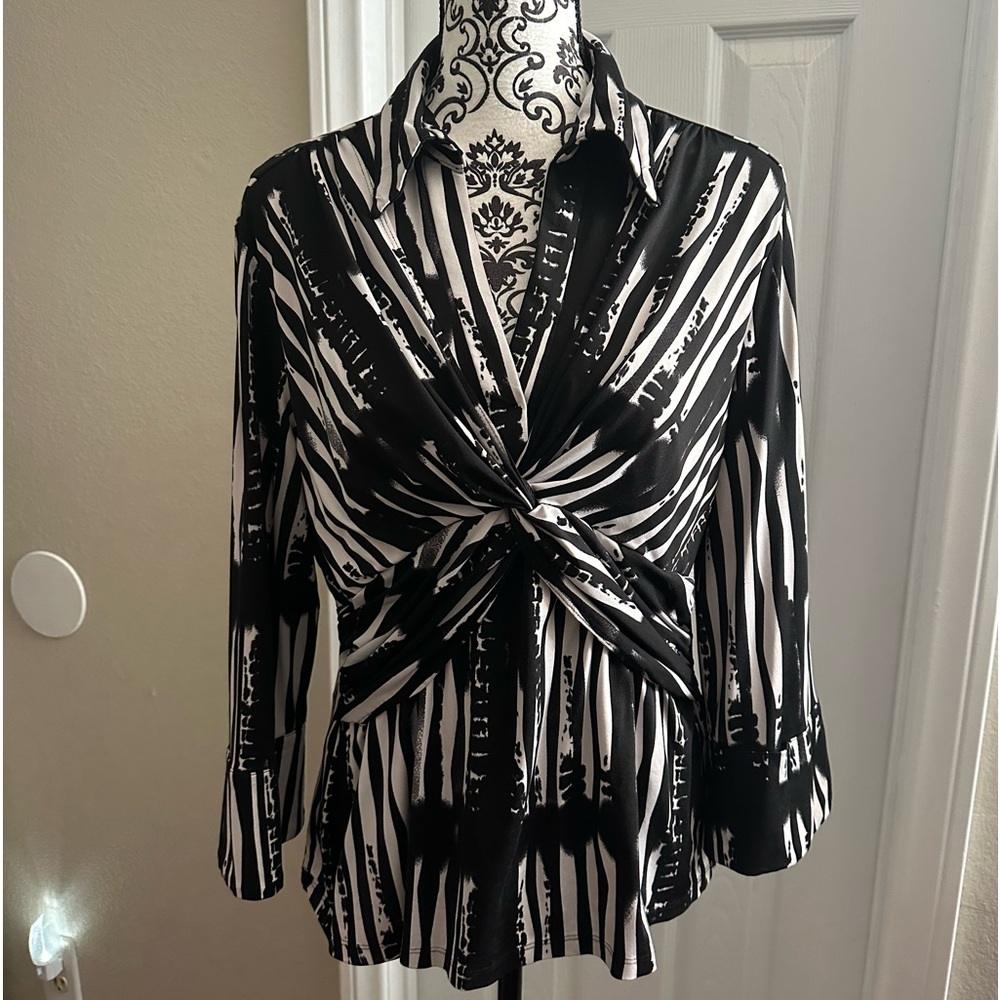 3/4 sleeve tops by Essentials. No piling and in excellent condition.